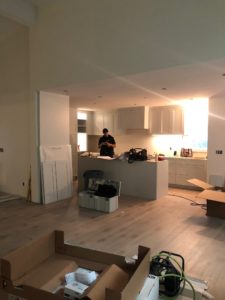 renovator - in progress renovation with boxes around