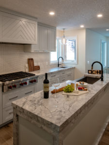 kitchen staging with fruit, cheese and wine