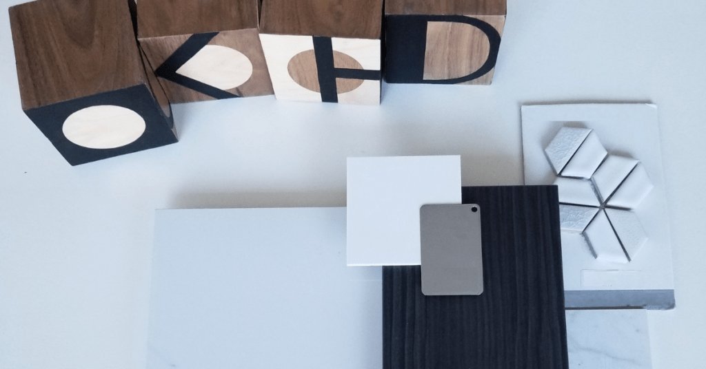 Bathroom renovation - tile samples, cabinet samples and KHD logo blocks.