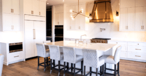 Kitchen Layout - prep island on sink. Planetary light above island. Statement hood fan