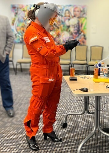 Aging in place - Britt trying to read small print in the Age Explorer suit.